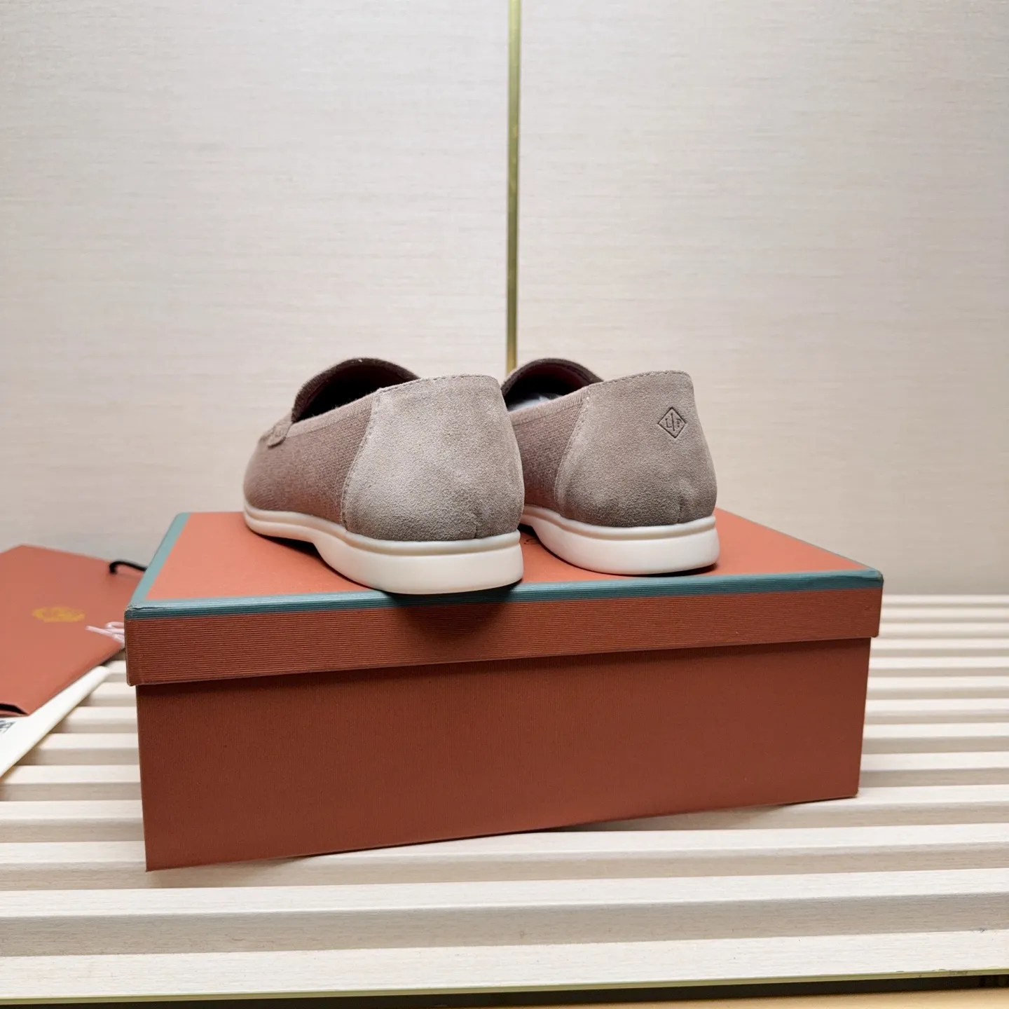 Men's Men's Shoes 💰400 Loro PIana moccasins are made of wish wool fabric. The upper is made of knitted fabric, made on a loom, and then attached to a rubber sole. The Rain System's water-repellent treatment enhances the shoe's functional design, while the suede details give the shoe a sense of elegance and sophistication. Made from Wish, fine wool from Australian and New Zealand Merino sheep